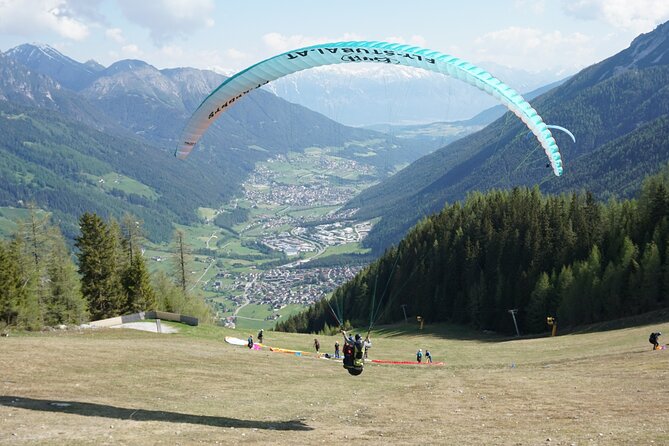 Paragliding experience in Fulpmes in the Stubai Valley - Safety briefing and equipment at the top