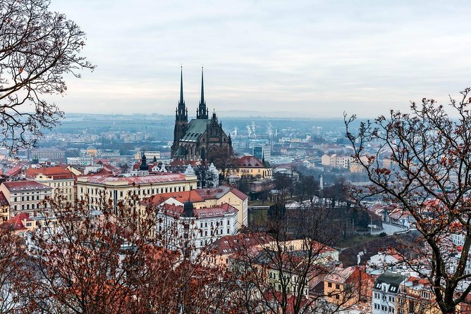 Prague-Vienna One-Way Sightseeing Day Tour - Lednice Palace: gardens, glass, and a tall Minaret