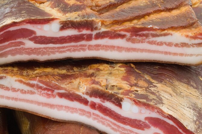 Private Artisanal Charcuterie "Marende" Cooking Class with a Chef - Cutting, arranging, and building the platter