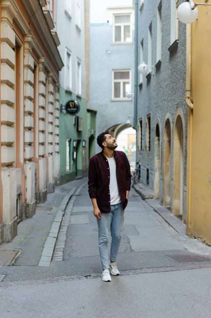Private Photoshoot Walk Old Town of Graz - Starting at the Weikhard Clock