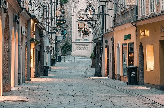 Salzburg Oldtown: Sightseeing Walking Tour with Licensed Local Guide - Crossing the Makartsteg and reading the river