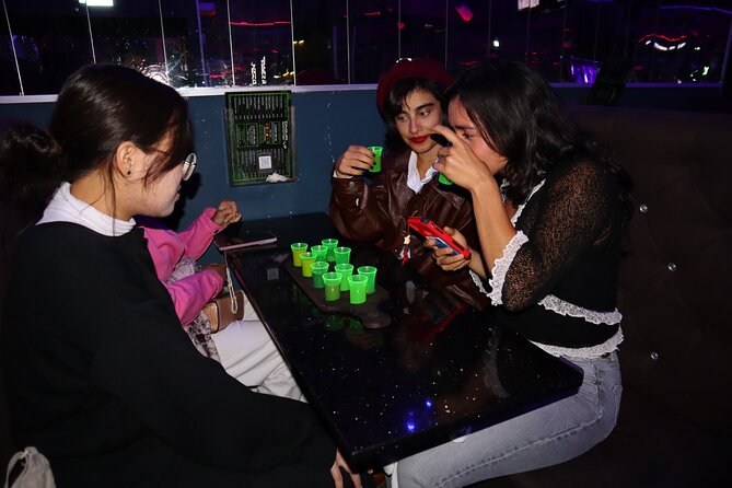 Saturday Night Pub Crawl for Professionals in Vienna, Austria - A glow-in-the-dark hour at Daiquiri Shotothek