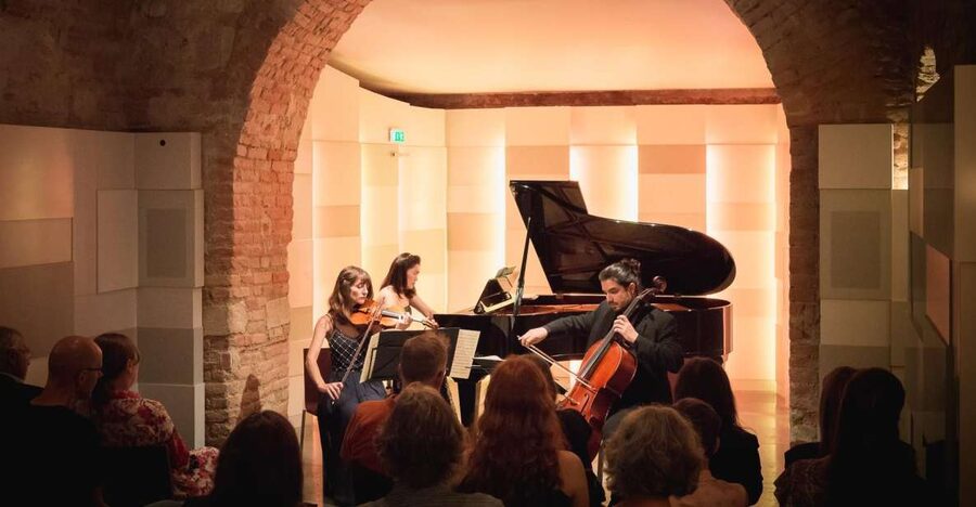 Vienna: Classical Concert at Mozarthaus with Museum Entry - Descending to the candlelit cellar