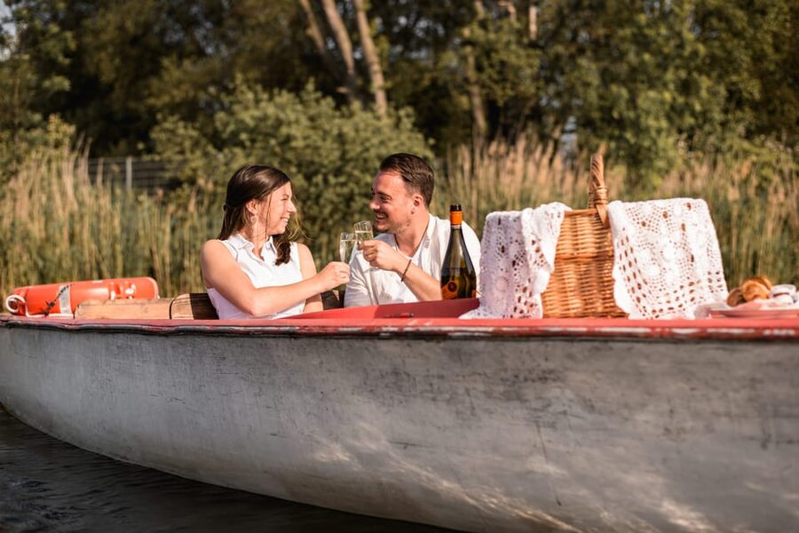 Vienna: Retro Boat Tour on the Danube River with Picnic - How the Tour Handles Rain and Changing Weather